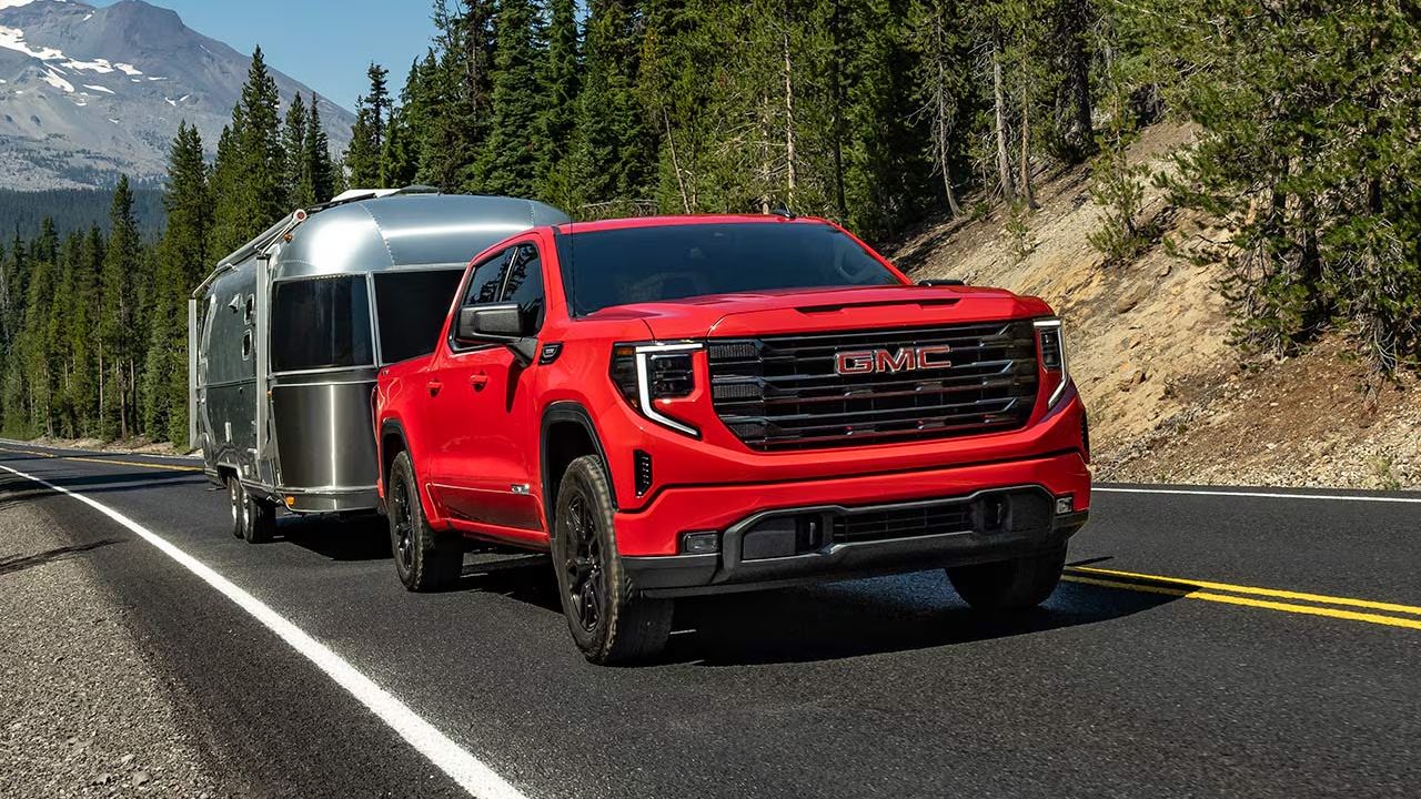 2026 GMC Sierra 1500 towing a travel trailer